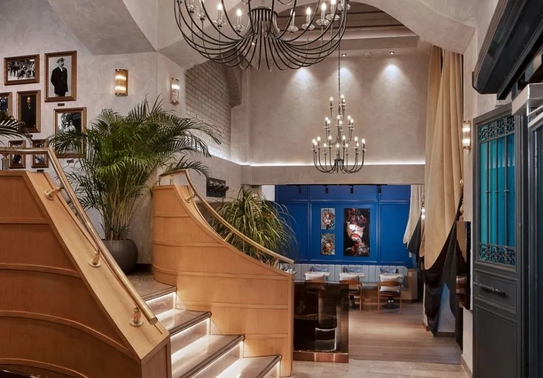 Curved staircase and chandeliers in the lobby