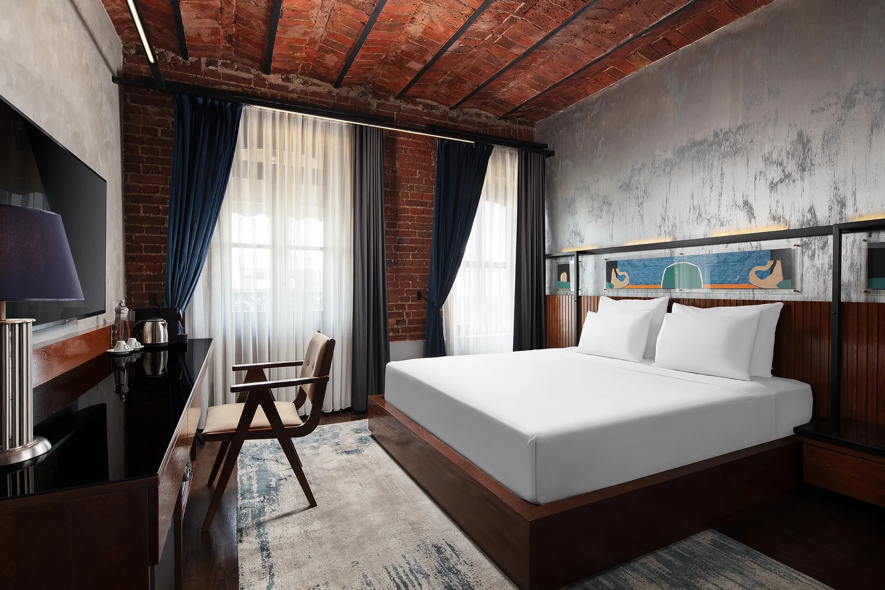 House Building guest room with a King bed and tall windows