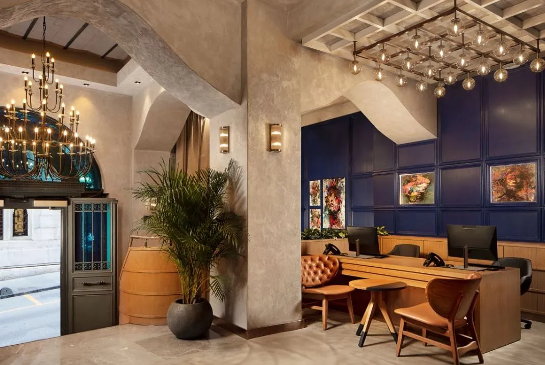 Reception and lounge with blue panelled walls