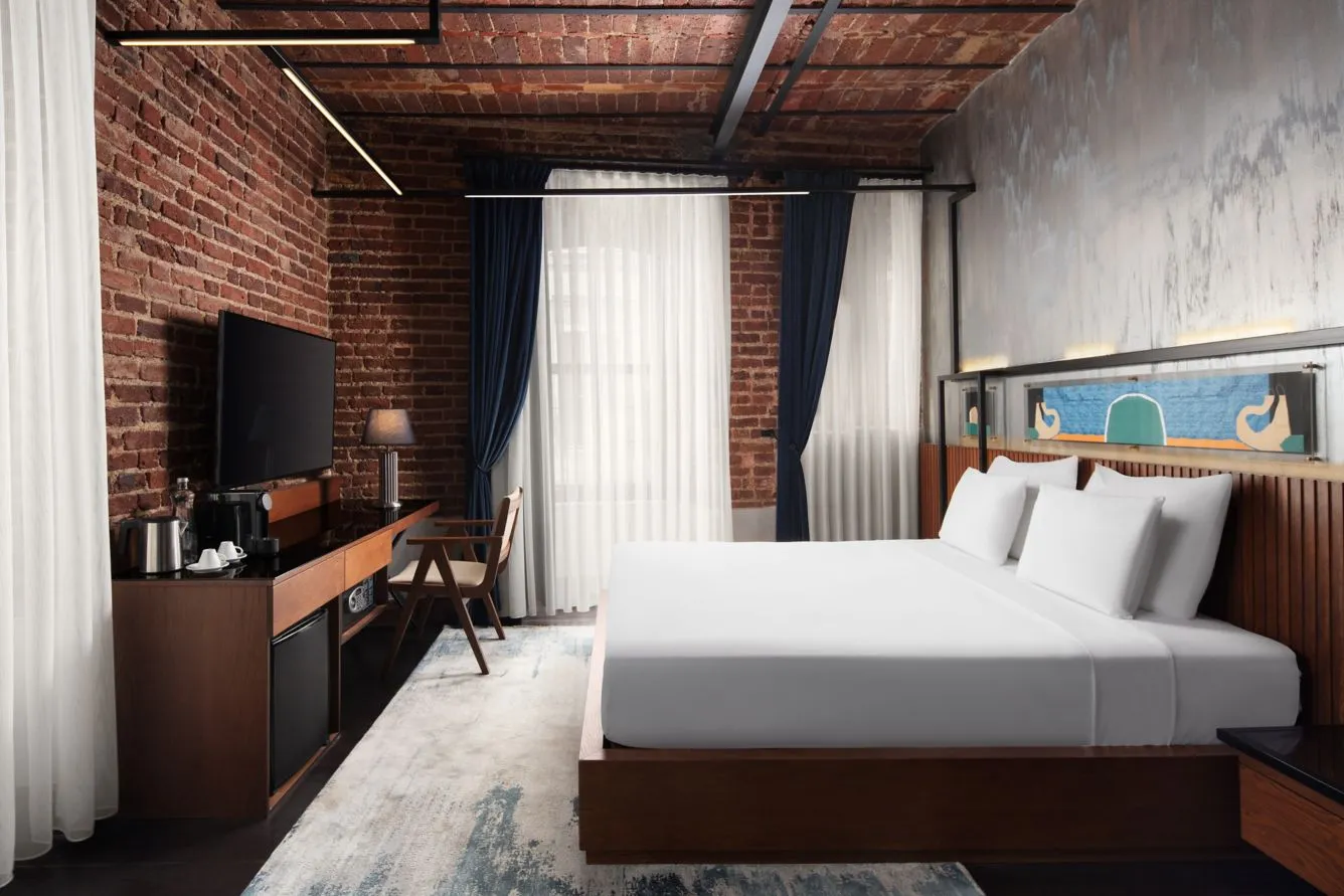 Galata House Premium room with a King bed and exposed brick