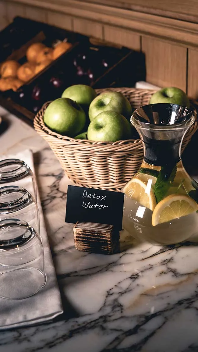 Breakfast table with fresh fruit and juices