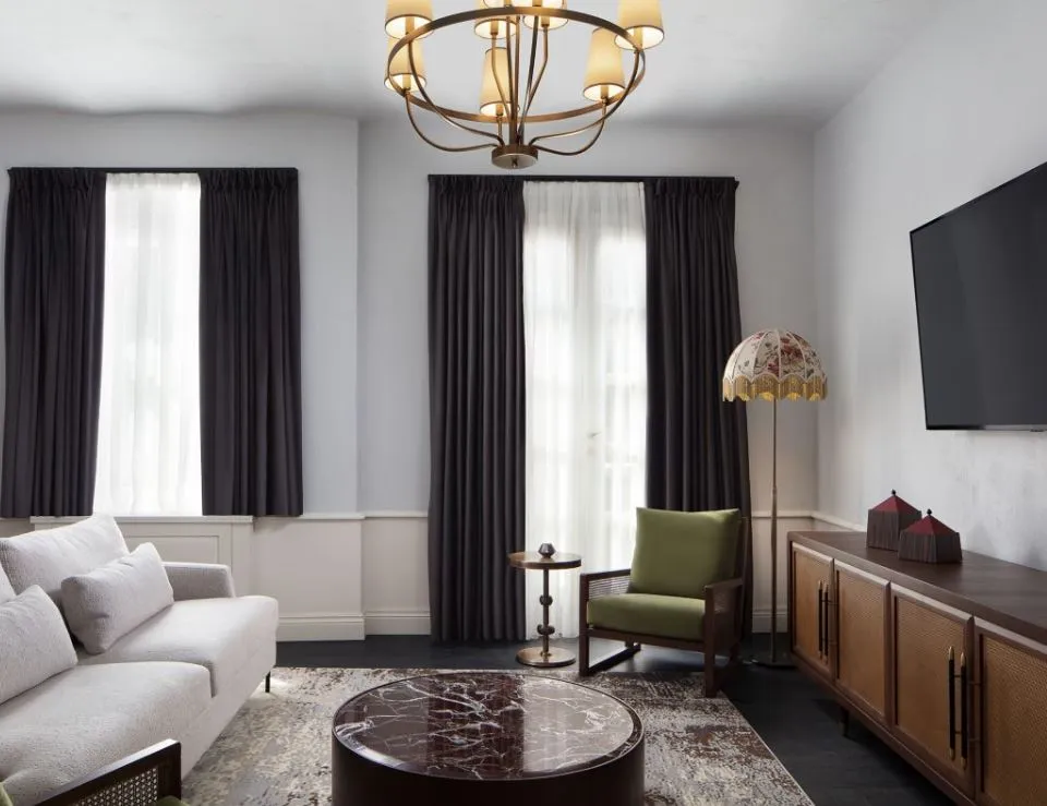 Suite living room with sofa and marble table